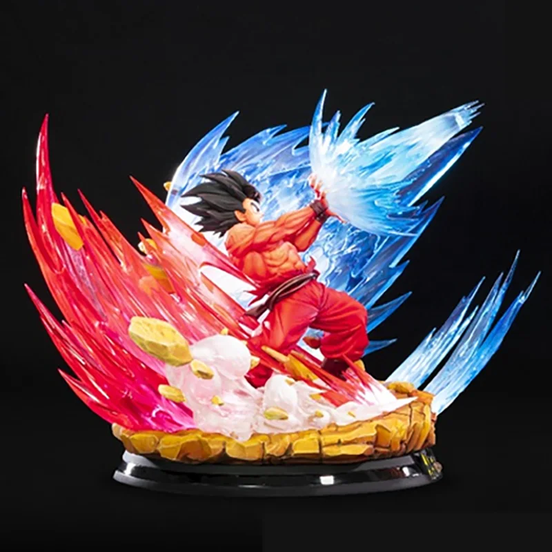 Dragon Ball Z character statue surrounded by blue and red sculpted energy effects.