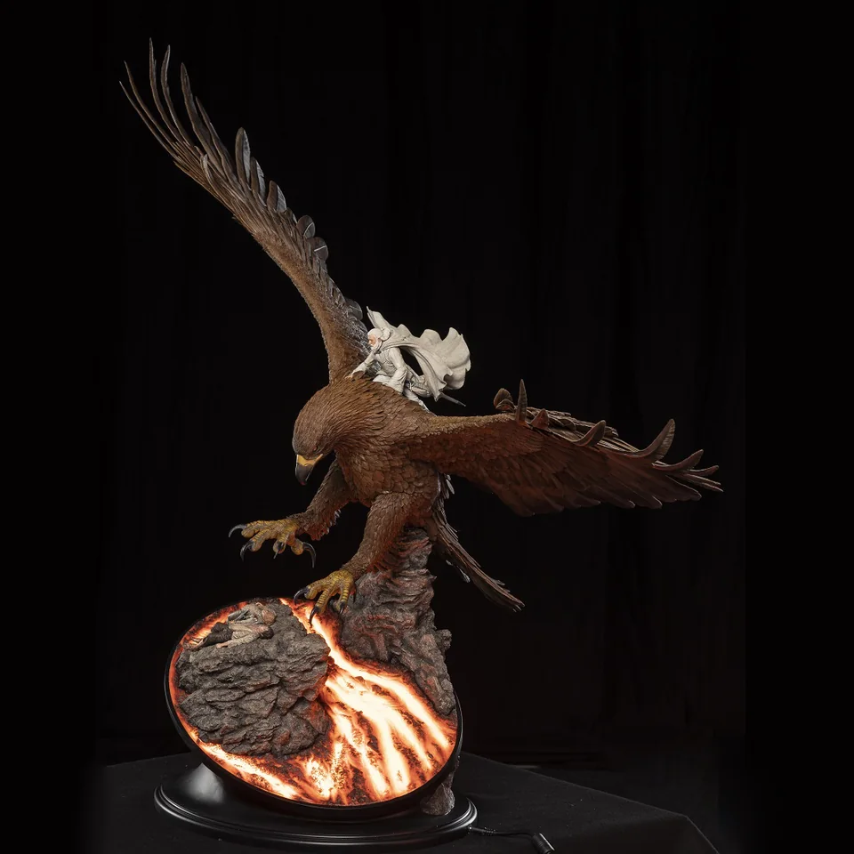 Eagle figure with outstretched wings above a dramatic scene base.