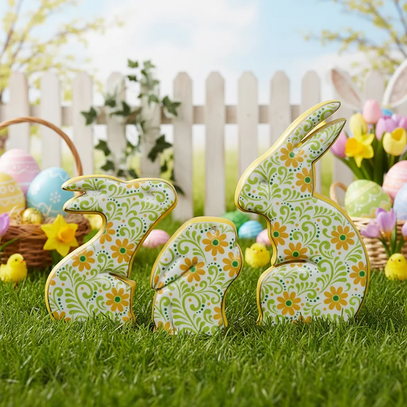 Rabbit-shaped decorations with green and yellow floral patterns and interlocking silhouettes.