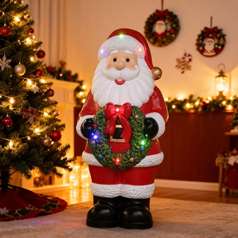 Santa figure in a red suit holding a green wreath with colorful accents.